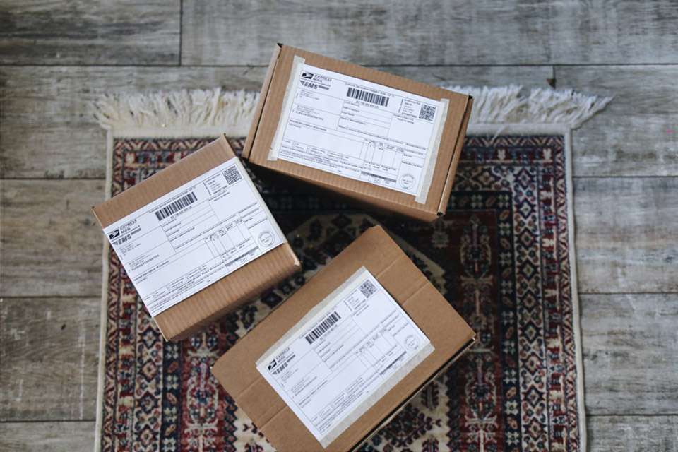 delivery-boxes-over-a-carpet-on-the-floor